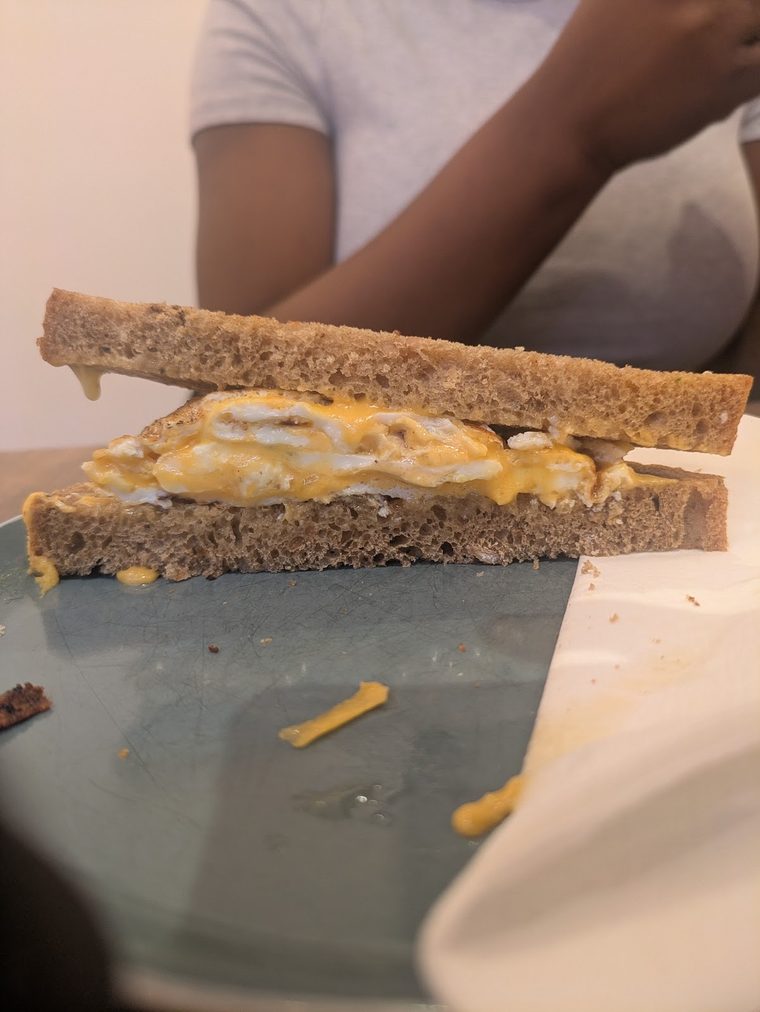 Toasted cheese sandwich cut in half